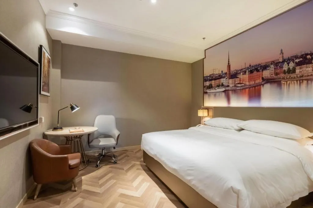 Bed in Vienna Hotel Jiangsu Dongtai Wanghai West Road