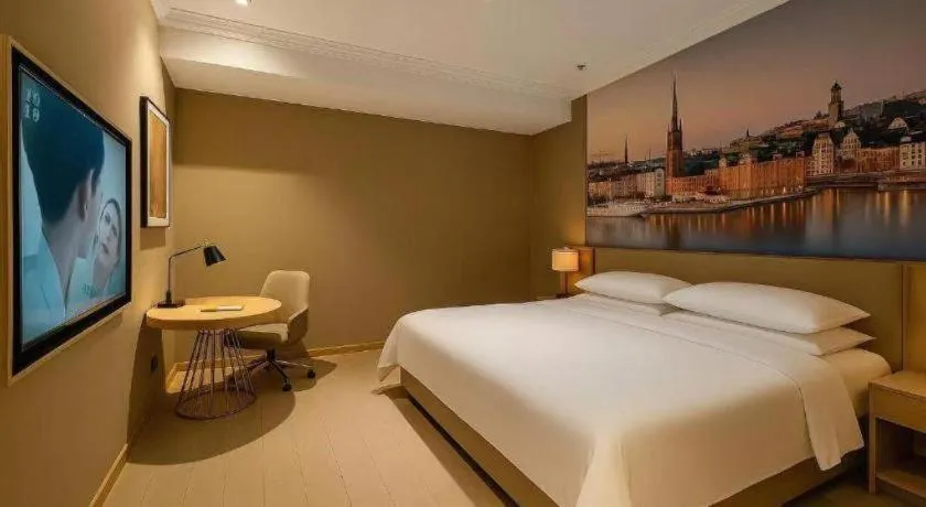 Bed in Vienna Hotel Jiangsu Dongtai Wanghai West Road
