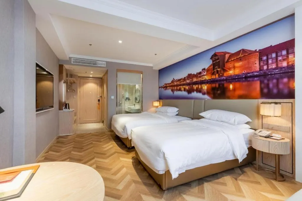 Bed in Vienna Hotel Jiangsu Dongtai Wanghai West Road