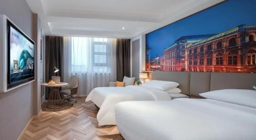 Bed in Vienna Hotel Jiangsu Dongtai Wanghai West Road