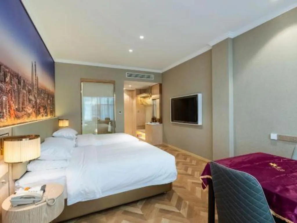Bed in Vienna Hotel Jiangsu Dongtai Wanghai West Road