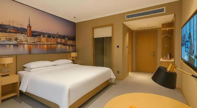 Bed in Vienna Hotel Jiangsu Dongtai Wanghai West Road