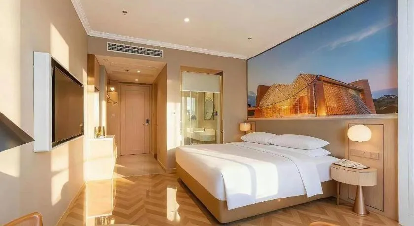 Bed in Vienna Hotel Jiangsu Dongtai Wanghai West Road
