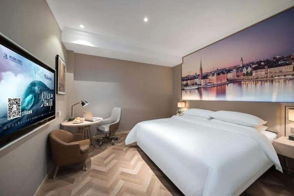 Bed in Vienna Hotel Jiangsu Dongtai Wanghai West Road