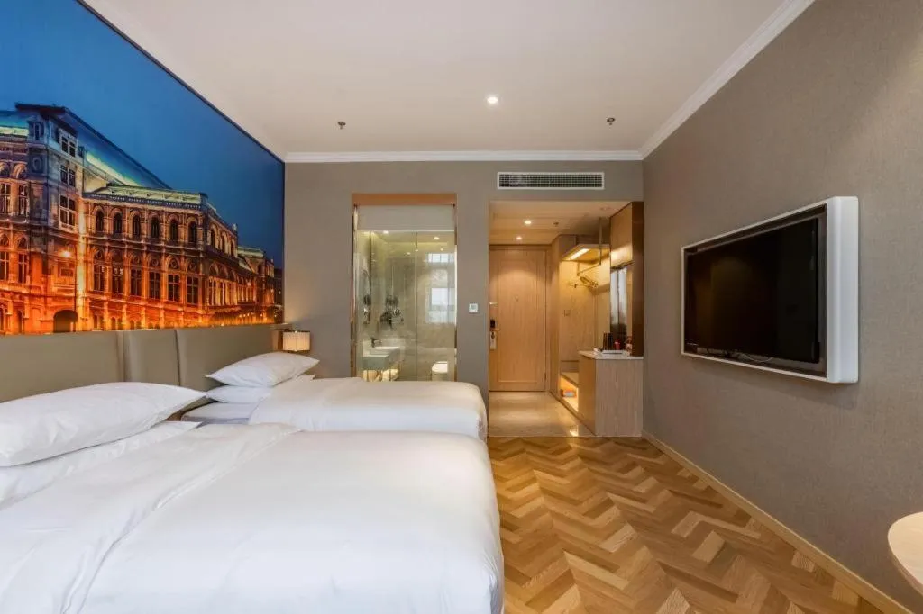 Bed in Vienna Hotel Jiangsu Dongtai Wanghai West Road