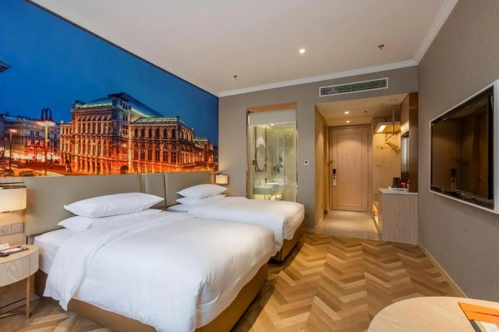 Bed in Vienna Hotel Jiangsu Dongtai Wanghai West Road