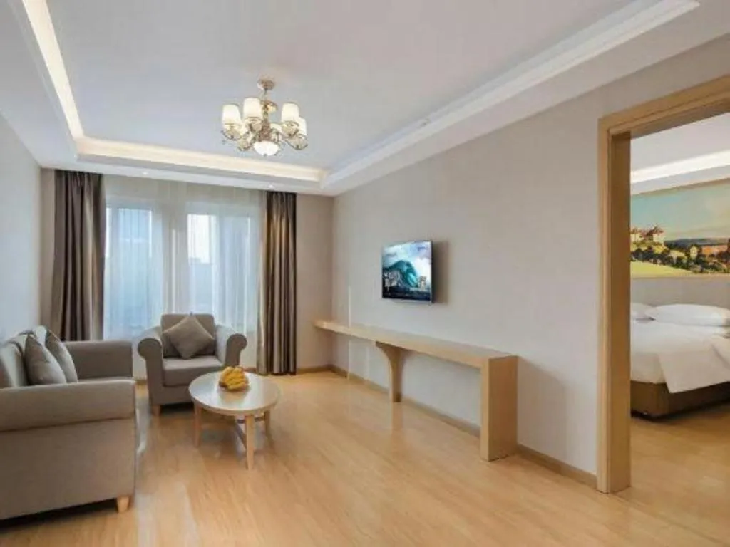 Bed in Vienna Hotel Jiangsu Dongtai Wanghai West Road