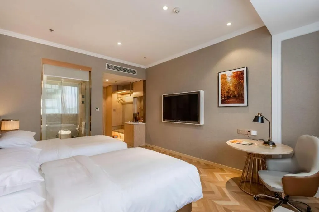 Bed in Vienna Hotel Jiangsu Dongtai Wanghai West Road