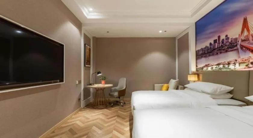 Bed in Vienna Hotel Jiangsu Dongtai Wanghai West Road