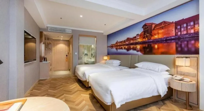 Bed in Vienna Hotel Jiangsu Dongtai Wanghai West Road