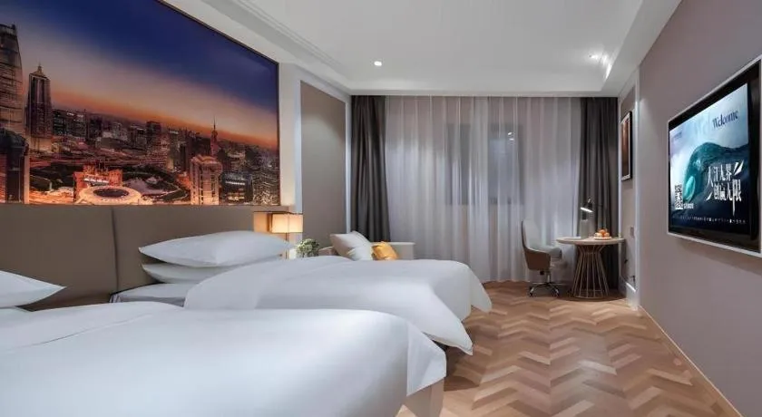 Bed in Vienna Hotel Jiangsu Dongtai Wanghai West Road