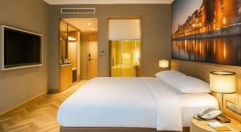 Bed in Vienna Hotel Jiangsu Dongtai Wanghai West Road