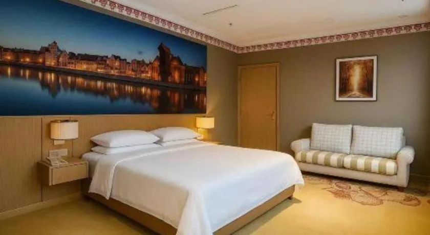 Bed in Vienna Hotel Jiangsu Dongtai Wanghai West Road