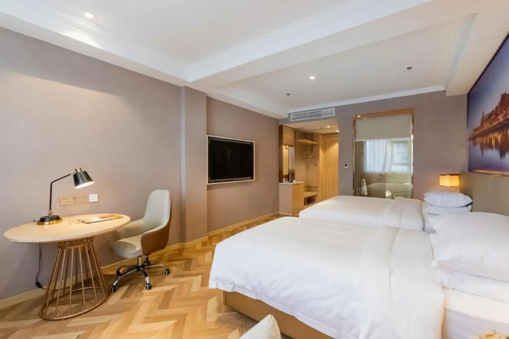 Bed in Vienna Hotel Jiangsu Dongtai Wanghai West Road