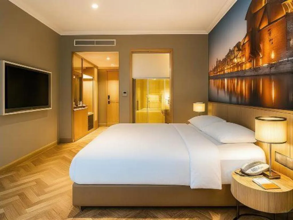 Bed in Vienna Hotel Jiangsu Dongtai Wanghai West Road
