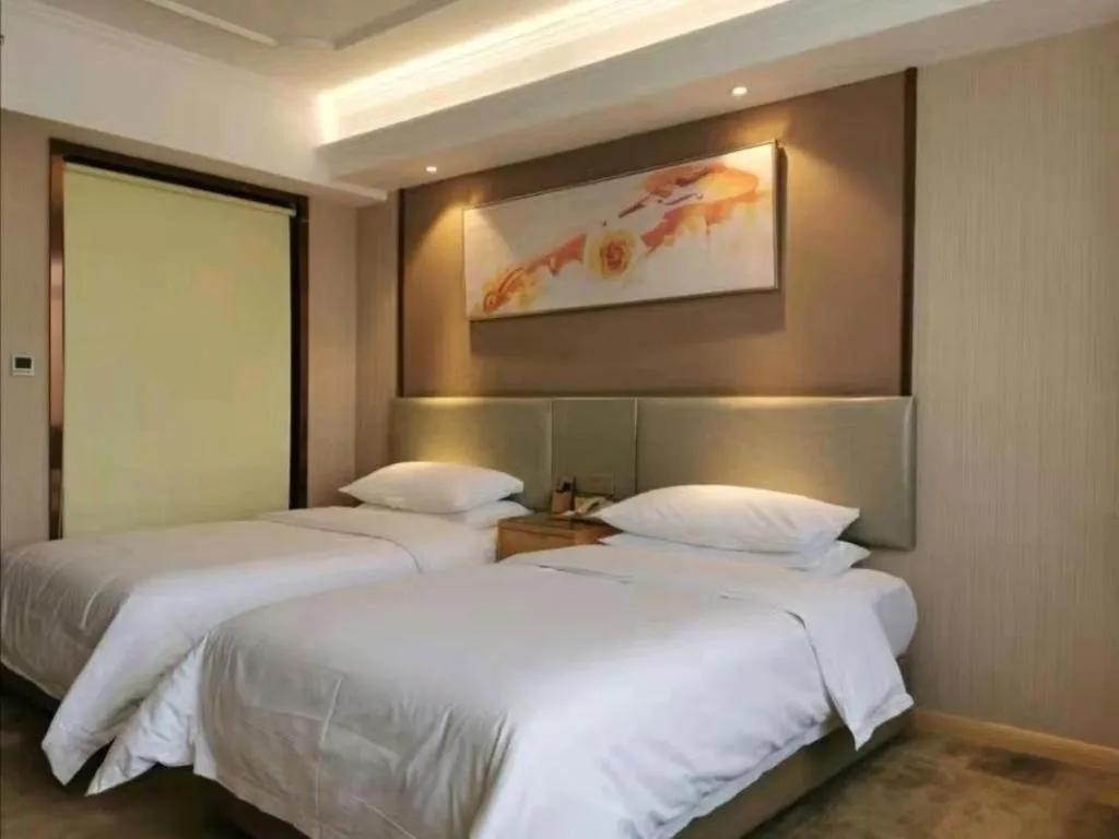 Bed in Vienna Hotel Anhui Huainan Shou County South Gate of Ancient Town Jinrun Central City