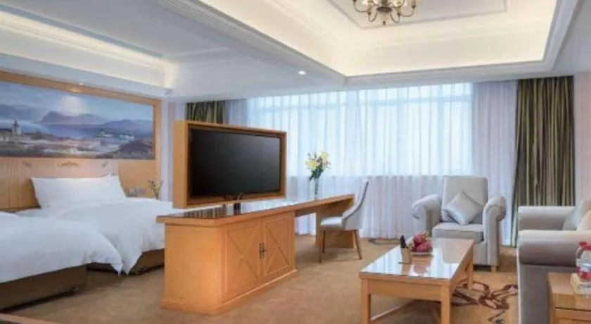 Bed in Vienna Hotel Guangdong Zhongshan Caihong Avenue