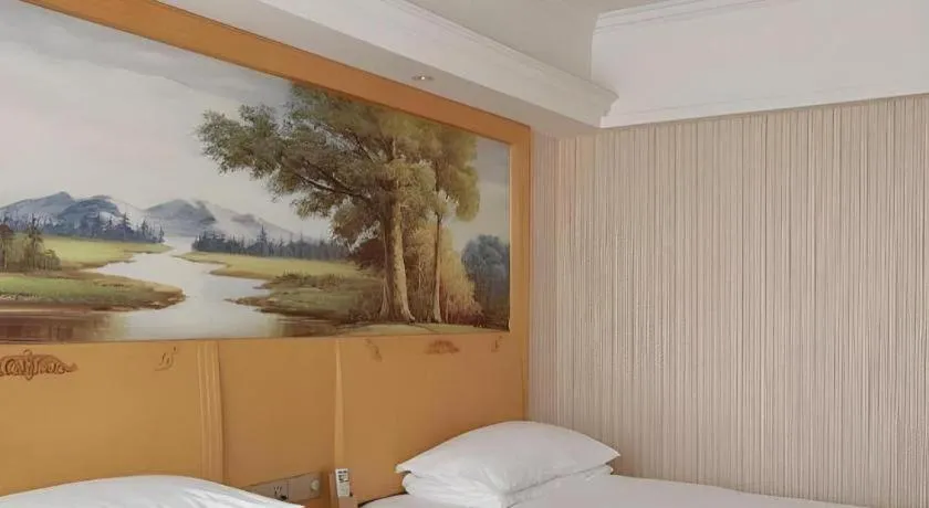 Bed in Vienna Hotel Guangdong Zhongshan Caihong Avenue