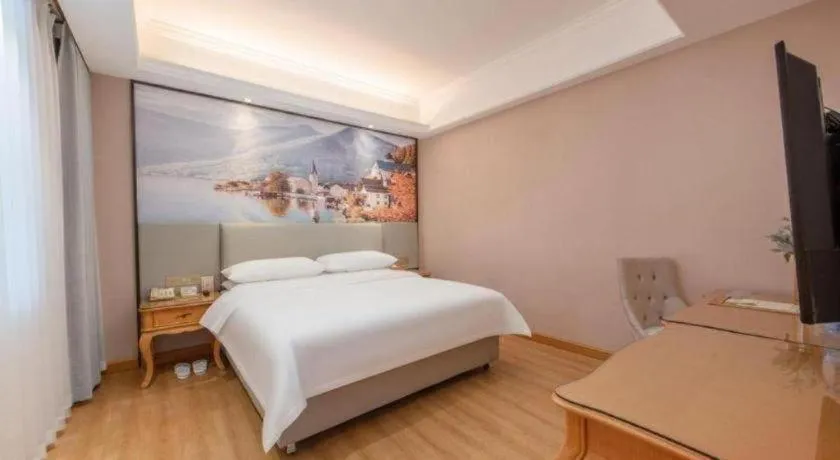 Bed in Vienna Hotel Changsha Yanghu Hanpu