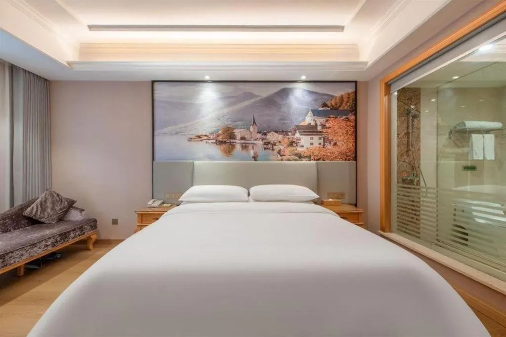 Bed in Vienna Hotel Changsha Yanghu Hanpu