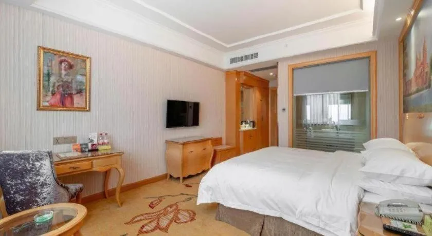Bed in Vienna Hotel Changsha Yanghu Hanpu