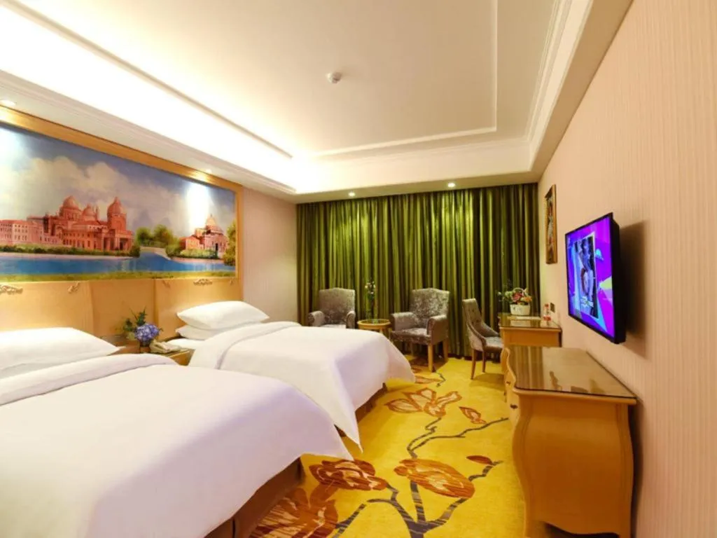 Bed in Vienna Hotel Changsha Yanghu Hanpu