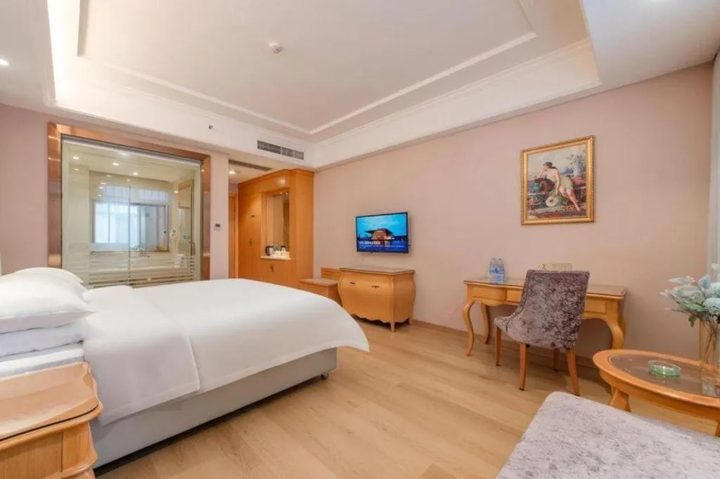 Bed in Vienna Hotel Changsha Yanghu Hanpu