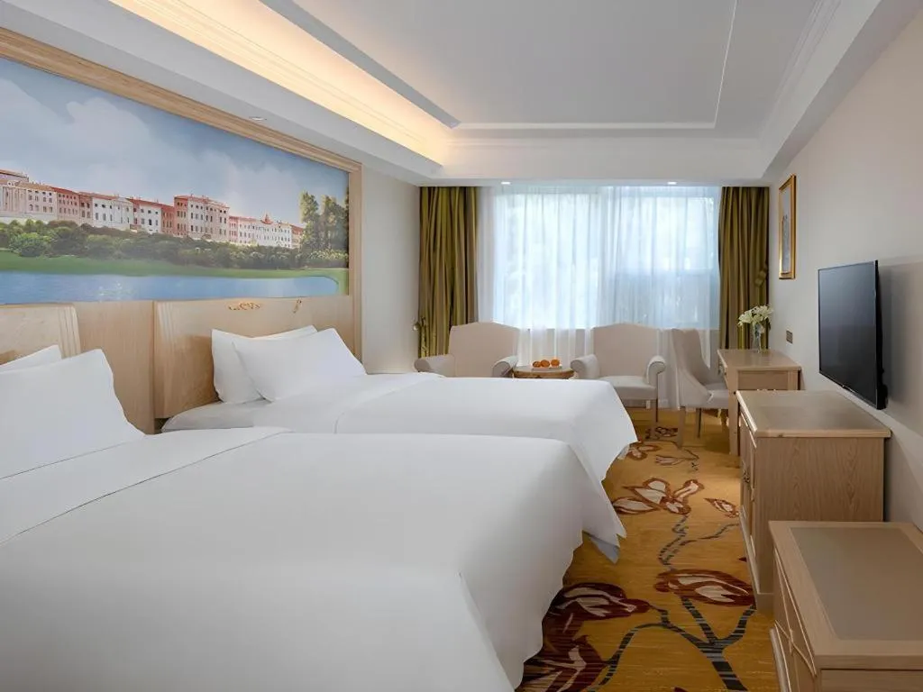 Bed in Vienna Hotel Shenzhen Window of the World Qiaochengdong Metro Station