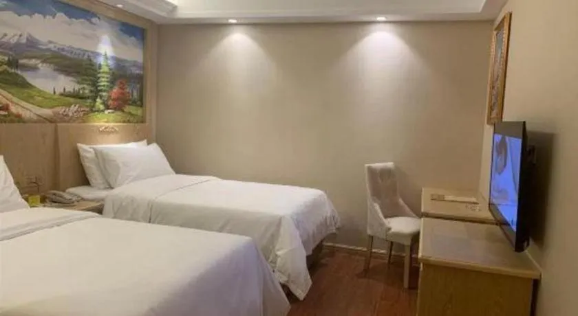 Bed in Vienna Hotel Shenzhen Window of the World Qiaochengdong Metro Station