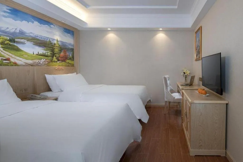 Bed in Vienna Hotel Shenzhen Window of the World Qiaochengdong Metro Station