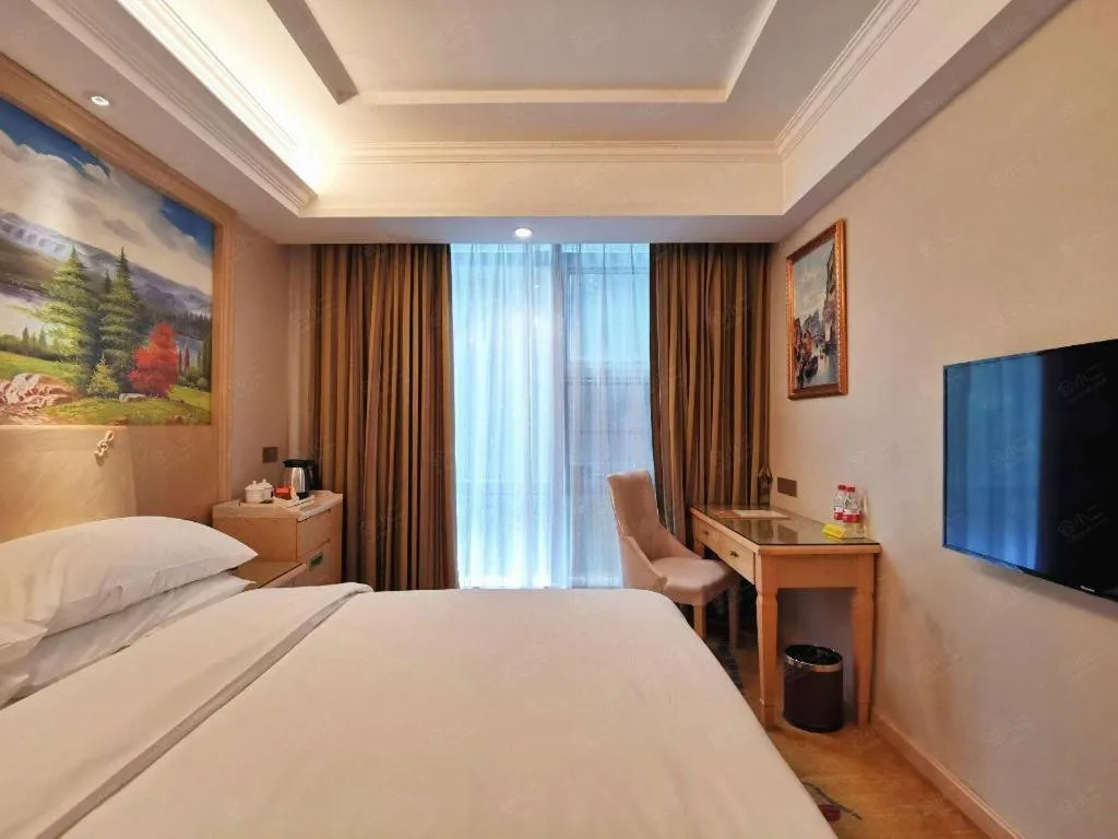 Bed in Vienna Hotel Shenzhen Window of the World Qiaochengdong Metro Station