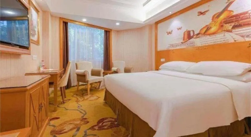 Bed in Vienna Hotel Shenzhen Window of the World Qiaochengdong Metro Station