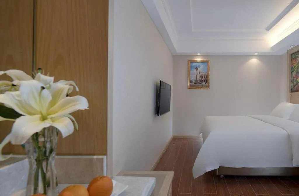 Bed in Vienna Hotel Shenzhen Window of the World Qiaochengdong Metro Station