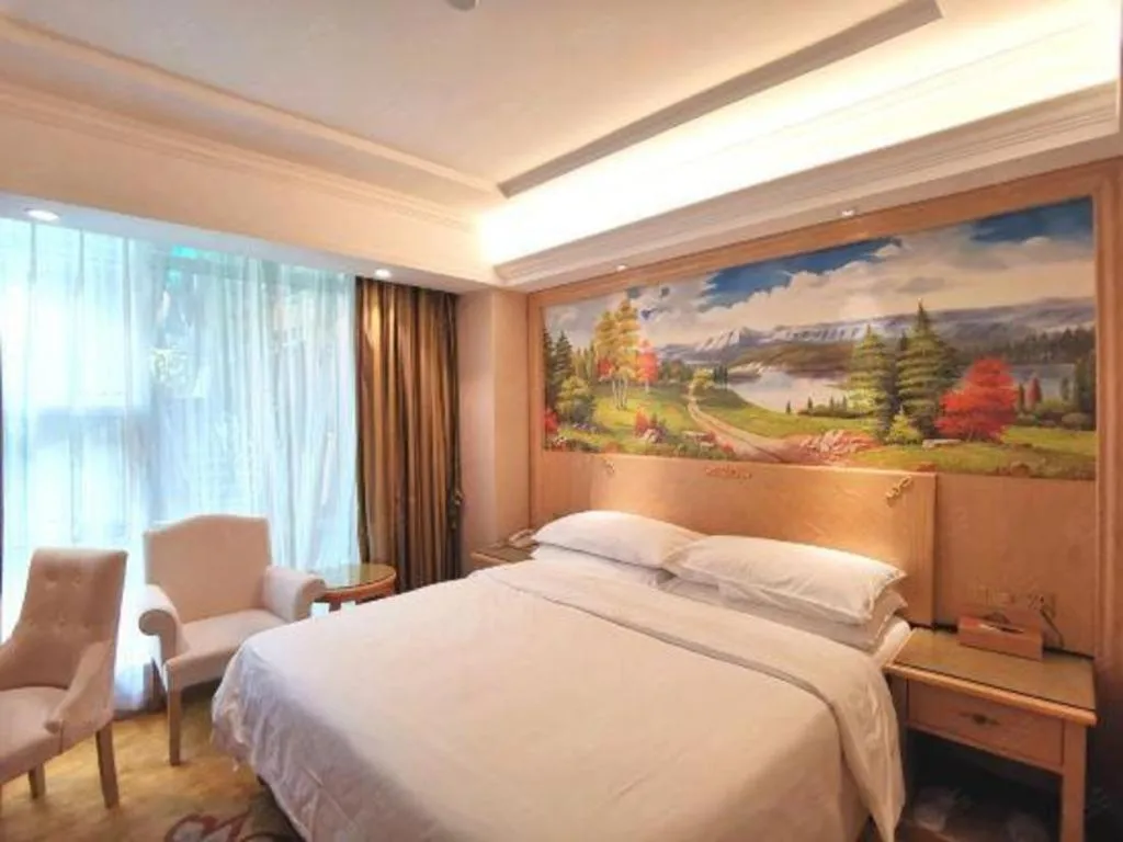 Bed in Vienna Hotel Shenzhen Window of the World Qiaochengdong Metro Station