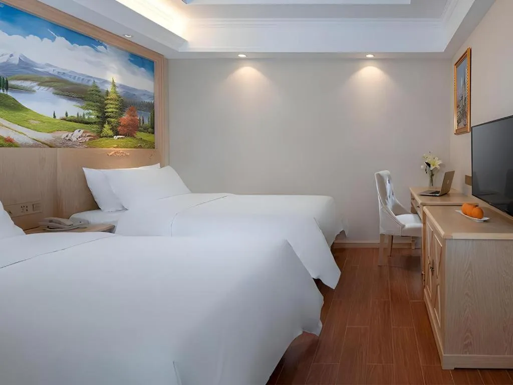 Bed in Vienna Hotel Shenzhen Window of the World Qiaochengdong Metro Station