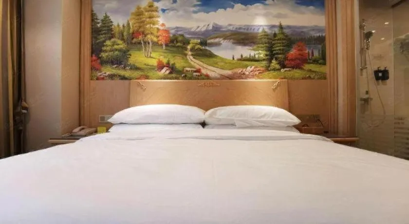 Bed in Vienna Hotel Shenzhen Window of the World Qiaochengdong Metro Station