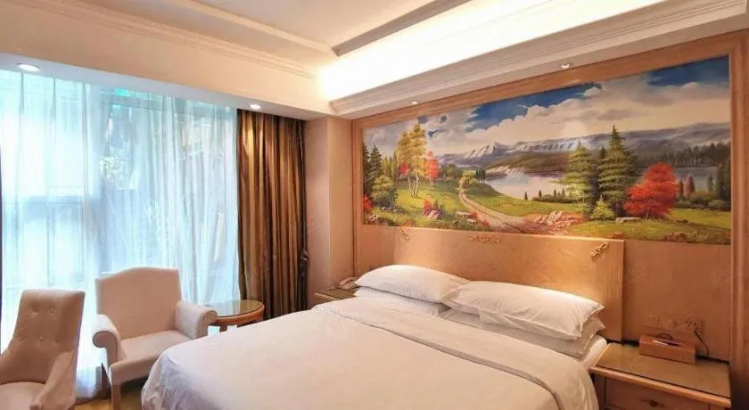 Bed in Vienna Hotel Shenzhen Window of the World Qiaochengdong Metro Station