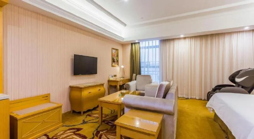 Bed in Vienna Hotel Guangdong Meizhou Fengshun