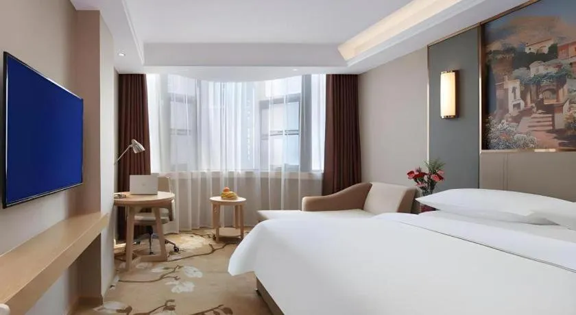Bed in Vienna Hotel Shaanxi Xianyang Huitong China Square