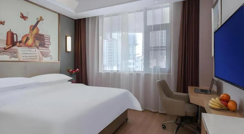 Bed in Vienna Hotel Shaanxi Xianyang Huitong China Square