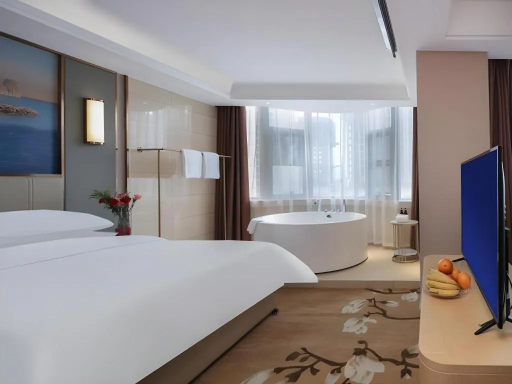 Bed in Vienna Hotel Shaanxi Xianyang Huitong China Square
