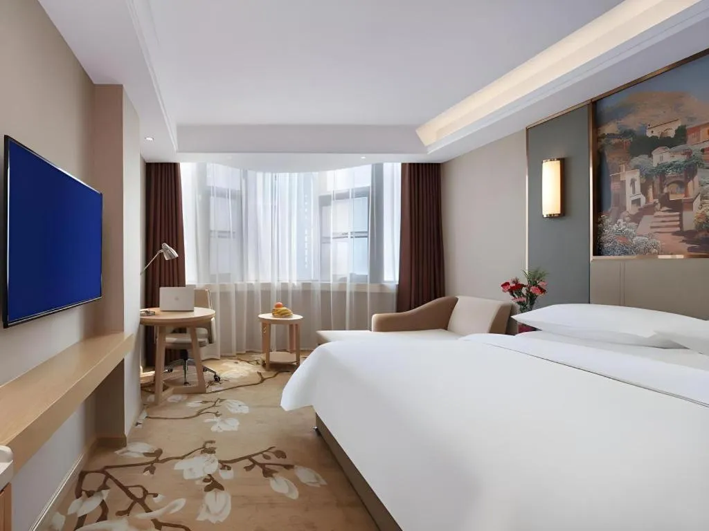 Bed in Vienna Hotel Shaanxi Xianyang Huitong China Square