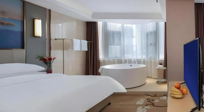 Bed in Vienna Hotel Shaanxi Xianyang Huitong China Square