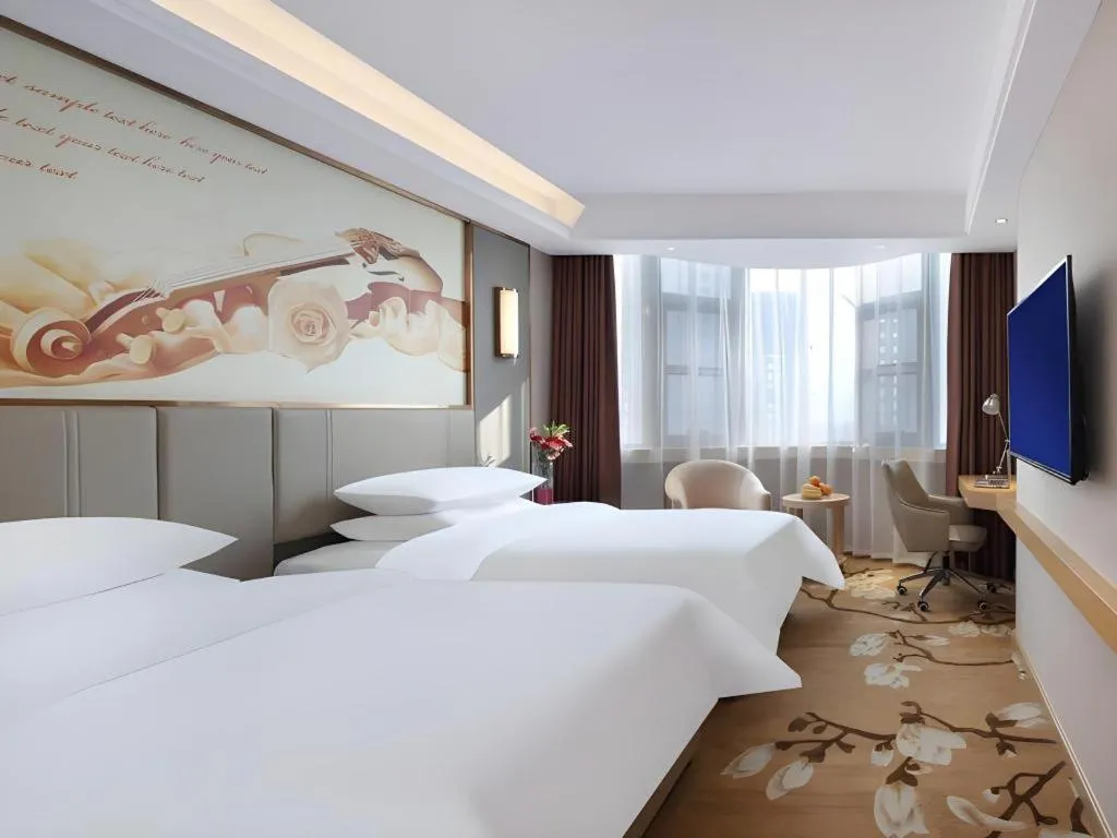 Bed in Vienna Hotel Shaanxi Xianyang Huitong China Square