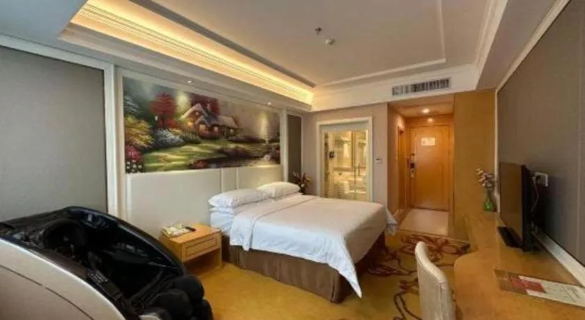 Bed in Vienna Hotel Guangdong Huiyang Qiuchang Yingbin Road