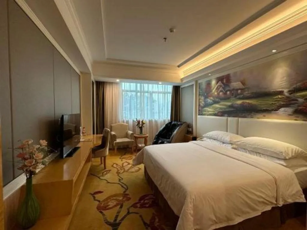 Bed in Vienna Hotel Guangdong Huiyang Qiuchang Yingbin Road