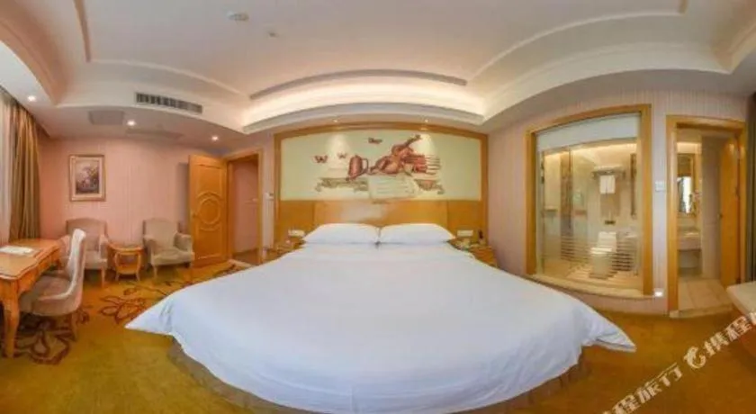 Bed in Vienna Hotel Guangdong Huiyang Qiuchang Yingbin Road