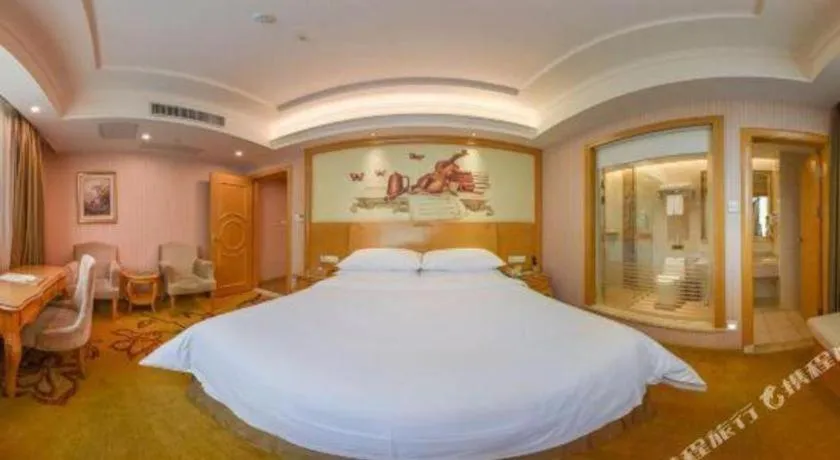 Bed in Vienna Hotel Guangdong Huiyang Qiuchang Yingbin Road