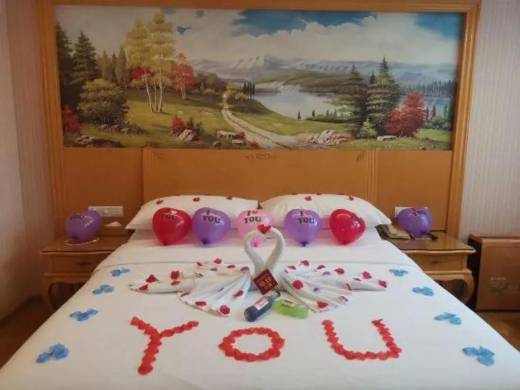 Bed in Vienna Hotel Guangdong Huiyang Qiuchang Yingbin Road