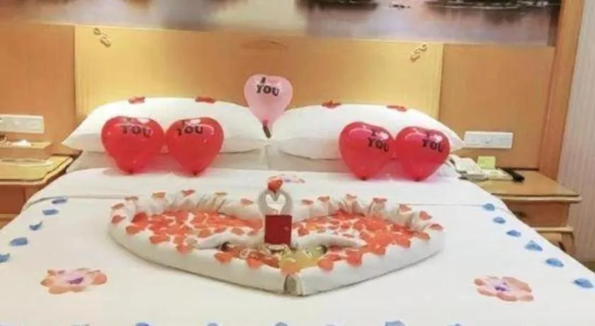 Bed in Vienna Hotel Guangdong Huiyang Qiuchang Yingbin Road